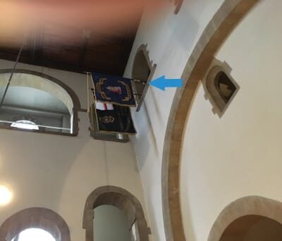 Temperature data logger attached to a flag pole high up in the cathedral's ceiling